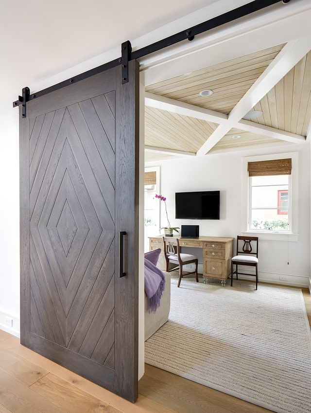 The study features Tongue and groove coffered ceiling and a large barn door designed to mimic the ceiling details #Tongueandgroove #cofferedceiling #barndoor