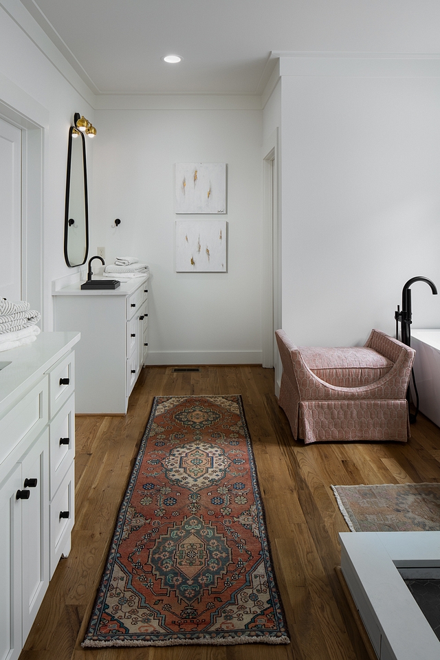 Hardwood flooring in bathroom The master bathroom features hardwood flooring Hardwood Flooring Custom White Oak 3.25” wide, finished on site #bathroomhardwoodflooring #bathroom #HardwoodFlooring