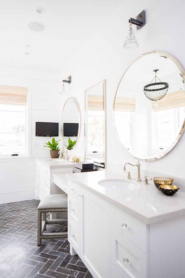 Bathroom vanity with double sinks and make-up vanity in the center The cabinet paint color is Dunn Edwards White and countertop New Carrara Quartz #bathroom #vanity #cabinet #countertop