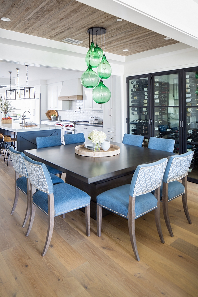 Dining room reclaimed wood shiplap ceiling For this dining room, they chose a reclaimed wood ceiling detail which complimented the wine wall designed by the homeowner Lighting Green blown glass jug cluster lighting #diningroom #reclaimedshiplap #shiplapceiling #ceililingshiplap #shiplap