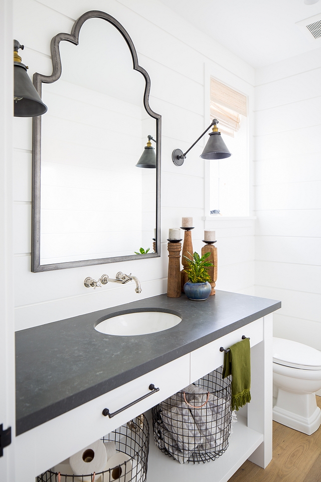 White powder room with shiplap The dark countertop beautifully constrasts with the white vanity and shiplap walls White powder room with shiplap The dark countertop beautifully constrasts with the white vanity and shiplap walls White powder room with shiplap The dark countertop beautifully constrasts with the white vanity and shiplap walls #Whitepowderoom #powderroom #shiplap #darkcountertop beautifully #whitevanity #bathroomshiplap