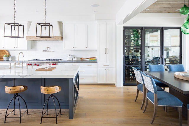 Shaker style kitchen White with shaker style cabinets and blue island Having shaker style cabinet throughout the house keeps the overall style clean and simple #shakerstylecabinet #kitchen #Whitekitchen #blueisland 