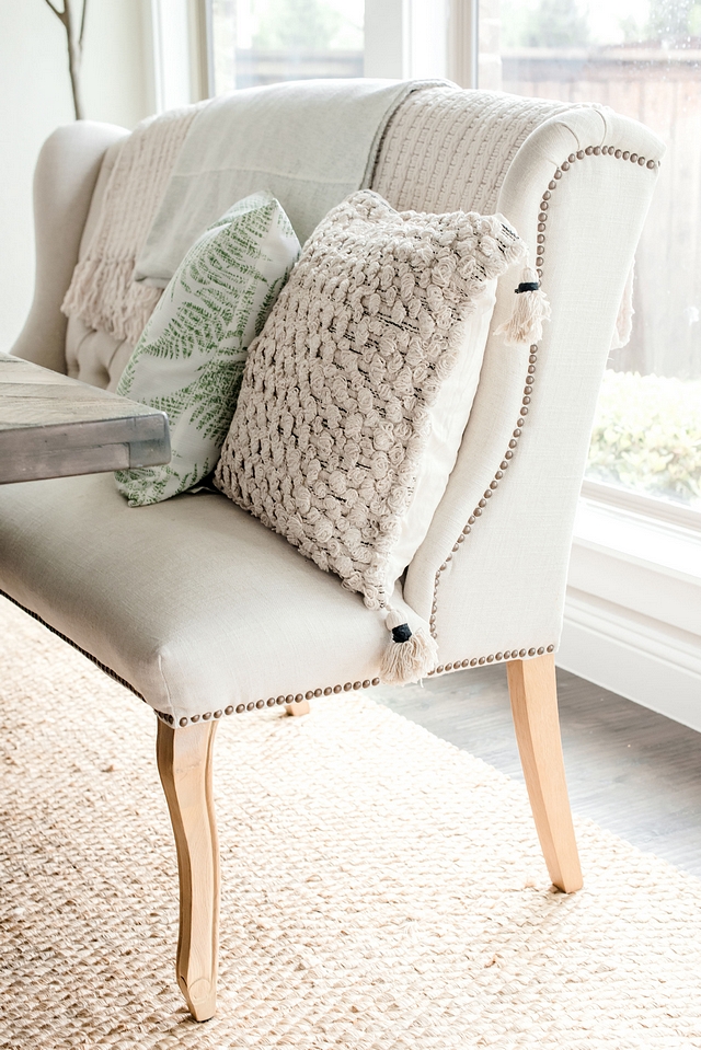 Banquette Pillows Pillows bring some extra texture to this beautiful dining room #pillows #diningroom #banquette #settee