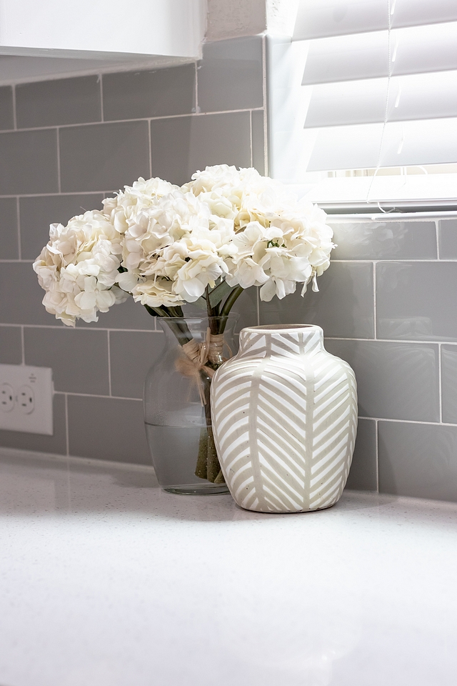 Kitchen backsplash The same grey subway tile continues from the kitchen into the pantry Grey tile #kitchen #greytile