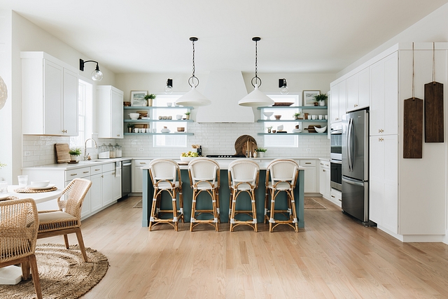 New Kitchen Design Ideas This kitchen is full of innovative ideas It features custom cabinets, custom floating shelves and an impressive hood Notice the wooden boards on the right side I am loving this #NewKitchenDesignIdeas #kitchen #kitchenideas