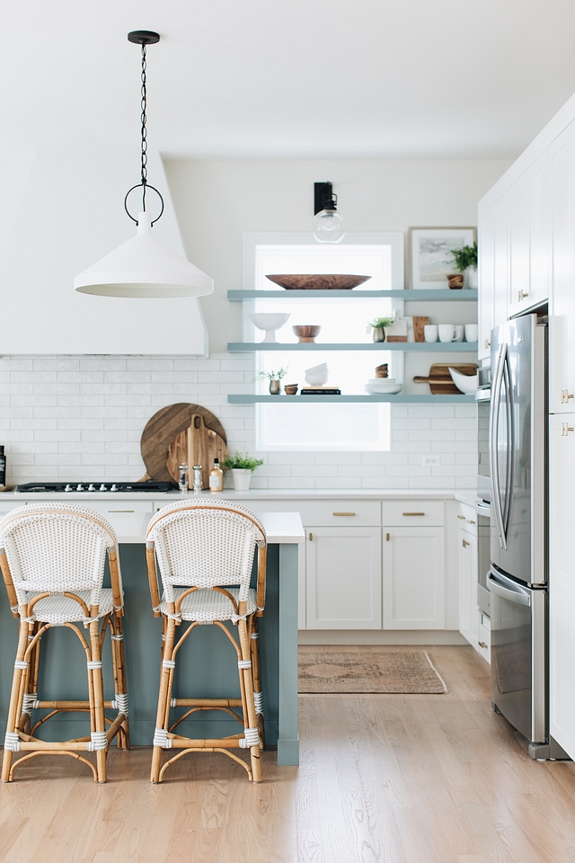 Blue color on Island and floating shelves is Benjamin Moore James River Gray