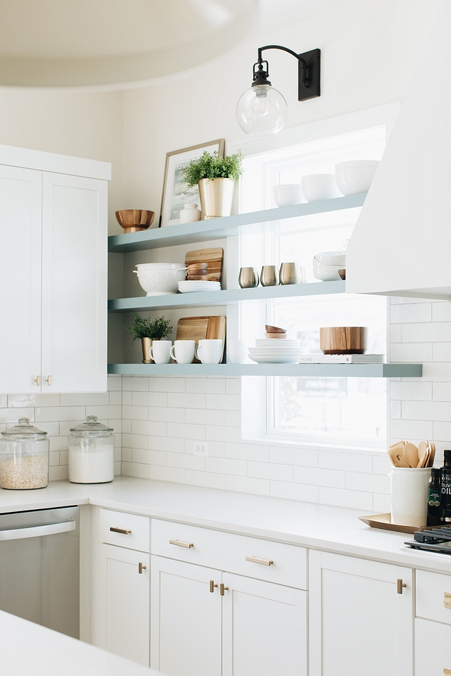 Kitchen Floating Shelves I knew I wanted the element of floating shelves in this kitchen but couldn’t really find a good spot. The horizontal lines on the windows inspired me to take the shelves all the way across the windows on the main wall of the kitchen #floatingshelves #kitchenshleves