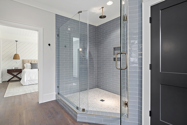Blue grey subway tile shower We went with this bold blue grey tile for the master shower Adding the brass banding and brass hardware really compliments the look. To not overwhelm the eyes, we went with white/grey tile on the floor #bluegreytile #subwaytile #showertile #shower #bathroom