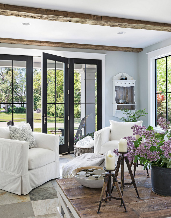 Farmhouse Living Room with Black French Doors Farmhouse Living Room with Black French Doors leading to porch Farmhouse Living Room with Black French Doors #FarmhouseLivingRoom #BlackFrenchDoors