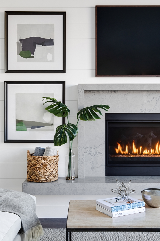 The fireplace features a grey marble surround and hearth bench #fireplace #fireplacehearth #fireplacesurround