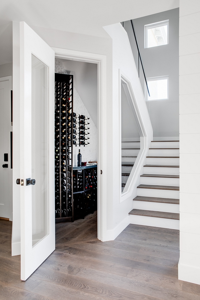 Wine cellar The wine cellar is located under the stairs and it features a glass door wine cellar wine cellar wine cellar #winecellar #understairswinecellar #wine