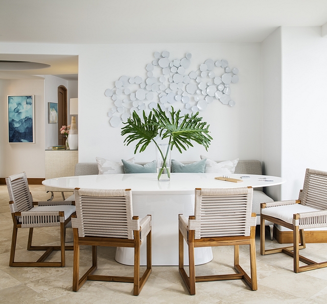 Dining room The dining room is located just off the kitchen and it features a large oval dining table with rope and Teak dining chairs #Diningroom #ovaldiningtable #ropediningchair #Teakdiningchair