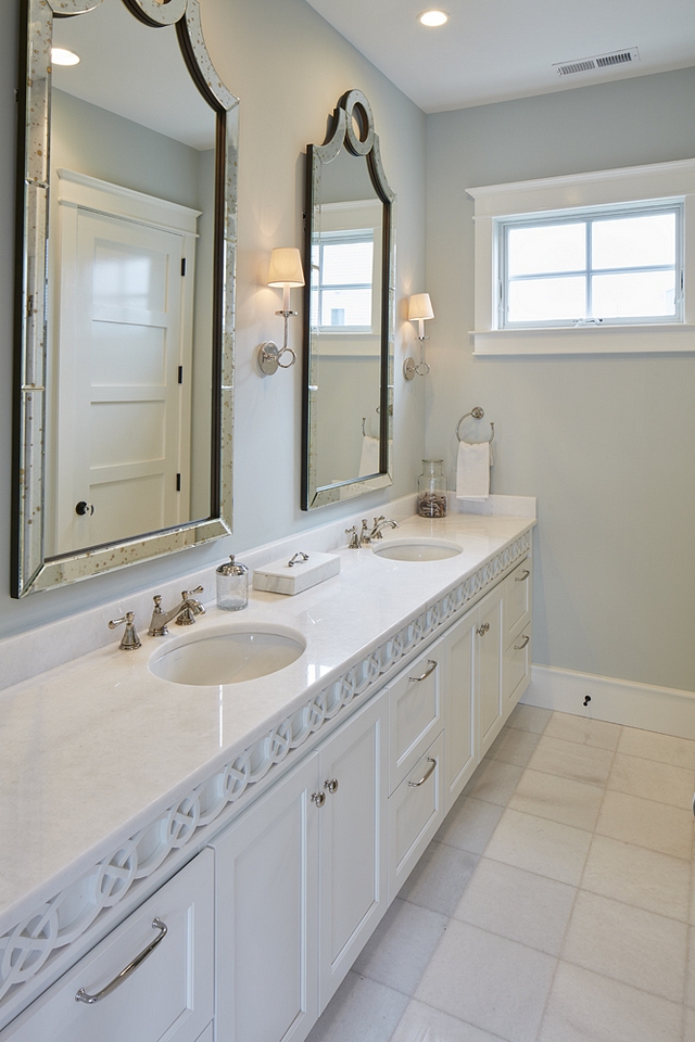 Bathroom wall paint color Cool Breeze by Benjamin Moore also featuring a custom cabinet with ornate trim design Cool Breeze by Benjamin Moore Cool Breeze by Benjamin Moore #CoolBreezeBenjaminMoore