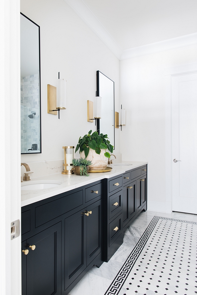 Black and white Bathroom The master bath was inspired by the black and white marble Greek key design Adding a different mosaic tile to the center of the tile rug was bold, but I think it really brought the whole look together Black and white Bathroom Black and white Bathroom Black and white Bathroom #BlackandwhiteBathroom