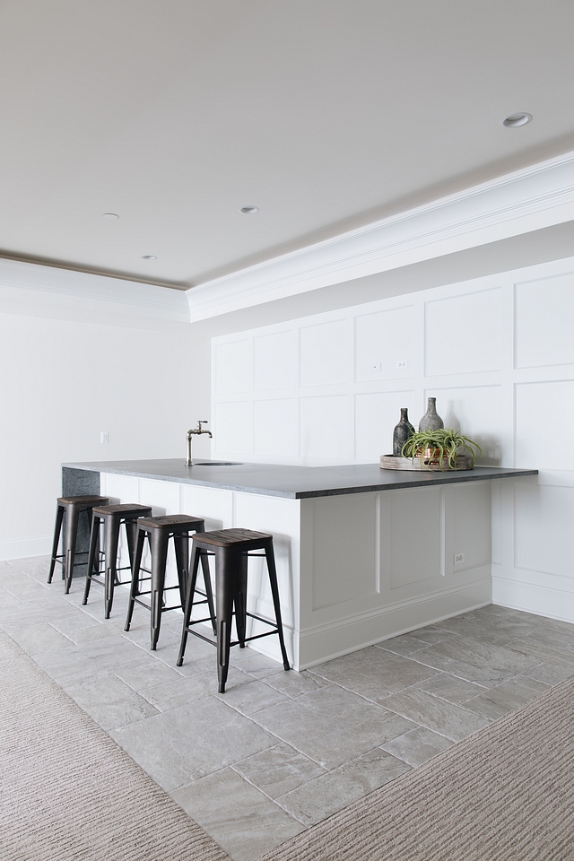 Bar Bar Countertop with waterfall edge - Caesarstone Rugged Concrete and square board and batten wall paneling Basement Bar Basement #Bar #Basement #Countertop #waterfalledgecountertop #CaesarstoneRuggedConcrete #squareboardandbatten #wallpaneling