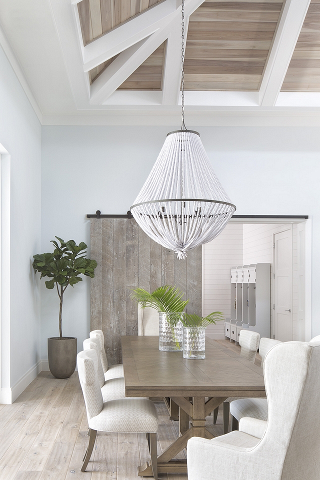 Benjamin Moore Silver Cloud Benjamin Moore Silver Cloud Beach house with whitewashed shiplap ceiling, whitewashed barn door, white beaded chandelier and Benjamin Moore Silver Cloud walls Benjamin Moore Silver Cloud #BenjaminMooreSilverCloud