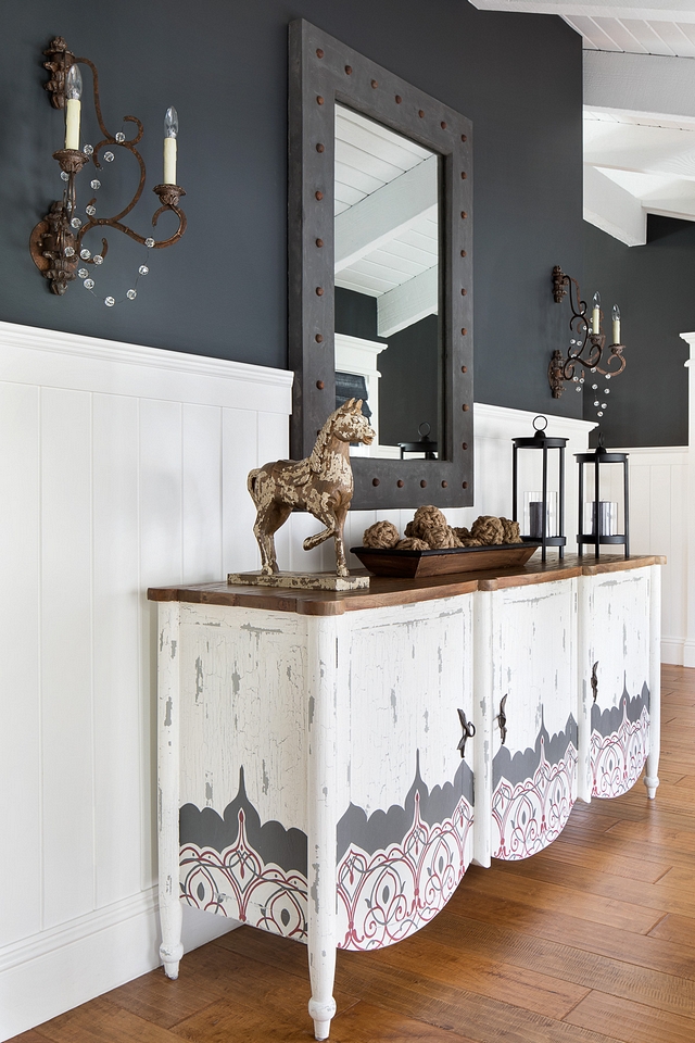 Entry Mirror In the entry, we added a concrete mirror with rust rivets. In order to accommodate the mirror, we cut into the bead board to be able to hang the mirror at the proper height. The result is a mirror that looks integrated and finished in the space Entry Mirror #EntryMirror #Entry #Mirror