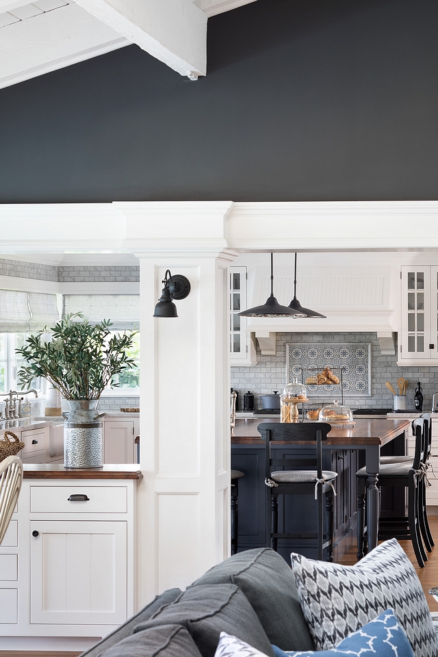 Wrought Iron by Benjamin Moore with Benjamin Moore White Dove Trim The trim and built-ins are painted in a soft white paint color, Benjamin Moore White Dove OC-17, which beautifully contrasts with the dark walls, in Benjamin Moore Wrought Iron #WroughtIronBenjaminMoore #BenjaminMooreWhiteDove