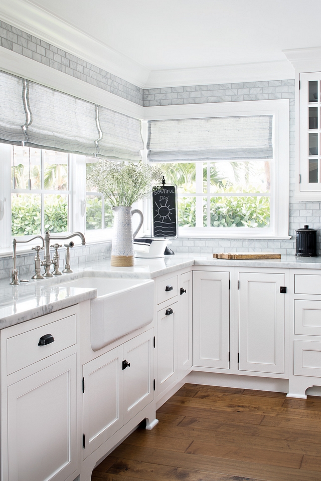 White kitchen with Carrara Marble countertop and Carrara marble subway tile We installed Carrara marble countertops and a 2x4 Carrara subway tile Classic White kitchen with Carrara Marble countertop and Carrara marble subway tile #White kitchen with Carrara Marble countertop and Carrara marble subway tile #Whitekitchen #CarraraMarble #marblecountertop #marblesubwaytile