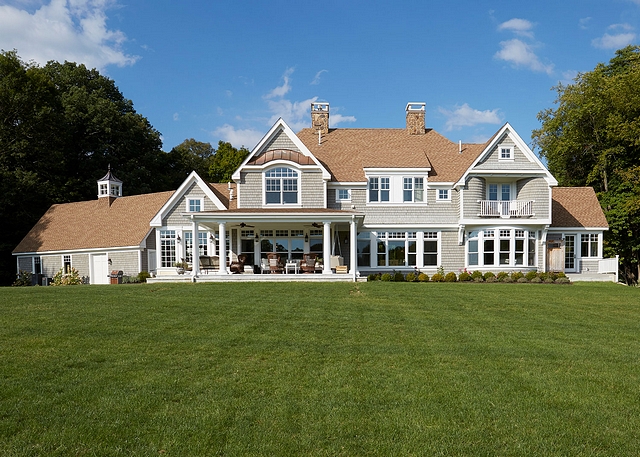 Rear Elevation Architecture The rear elevation features large covered porch, gray cedar shake siding, and white trim Dormer roof is standing seam copper #RearElevation #Architecture #backporch