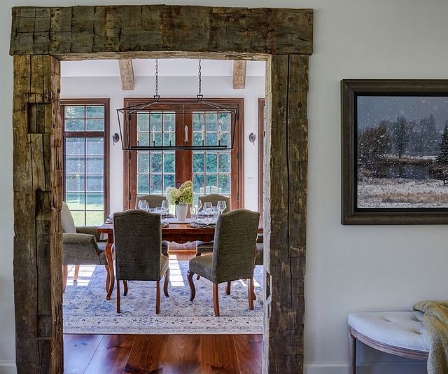 Hewn barn beams Reclaimed hand hewn barn beams are used for the entry to the dining room Hewn barn beams Hewn barn beams #Hewnbarnbeams