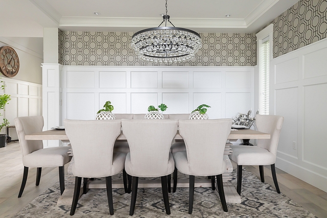 Dining Room with wallpaper above wainscoting Dining room with Classic wainscoting and a neutral geometric wallpaper above Dining Room with wallpaper above wainscoting #DiningRoom #wallpaperabovewainscoting #diningroomwainscoting #wainscoting