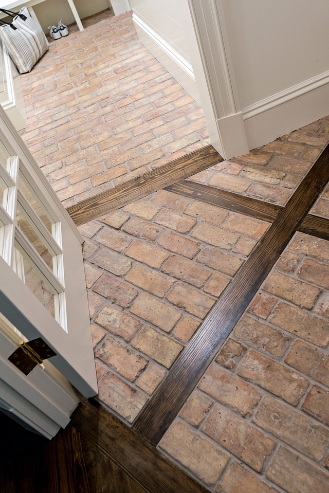 Brick and hardwood Flooring The new entry was outfitted with brick floor set in a diamond pattern and intersected by wooden planks matching the pine of the kitchen floor. The brick runs into the mudroom for a durable and unique surface #brick #hardwoodflooring #mudroom #flooring #floor