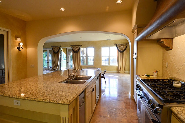 Kitchen Before and After Reno An archway used to separate the kitchen from the dining area