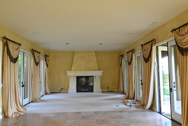 Living Room Before and After Reno The space had good bones but everything felt too heavy and outdated with the faux plaster walls and these ugly draperies