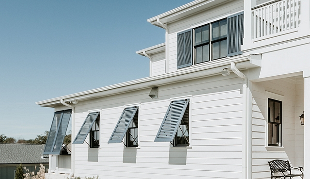 Shutters are painted in Benjamin Moore HC-154 Hale Navy Shutters Standard Louvered Shutters and Bahama Louvered Shutters #Shutters #BenjaminMooreHC154HaleNavy #Shutters #LouveredShutters #BahamaLouveredShutters