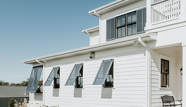 Shutters are painted in Benjamin Moore HC-154 Hale Navy Shutters Standard Louvered Shutters and Bahama Louvered Shutters #Shutters #BenjaminMooreHC154HaleNavy #Shutters #LouveredShutters #BahamaLouveredShutters