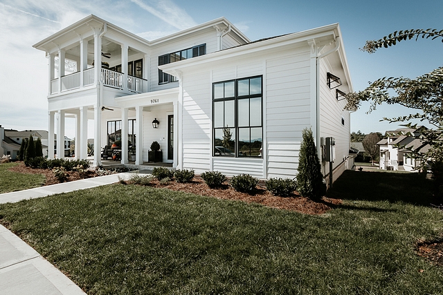 Sherwin Williams SW 7014 Eider White exterior home white siding with black windows Sherwin Williams SW 7014 Eider White exterior home white siding with black windows #SherwinWilliamsSW7014EiderWhite #exterior #home #whitesiding #blackwindows