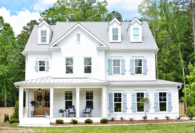 White Brick Home Exterior with Grey Shutters