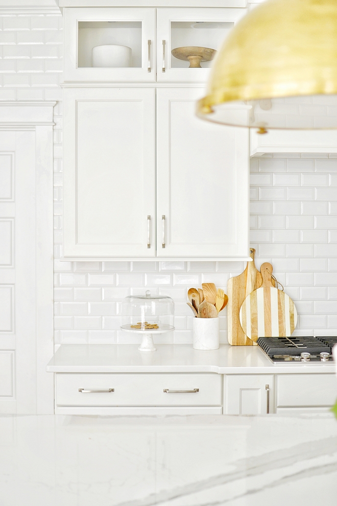 Kitchen backsplash is beveled subway tile