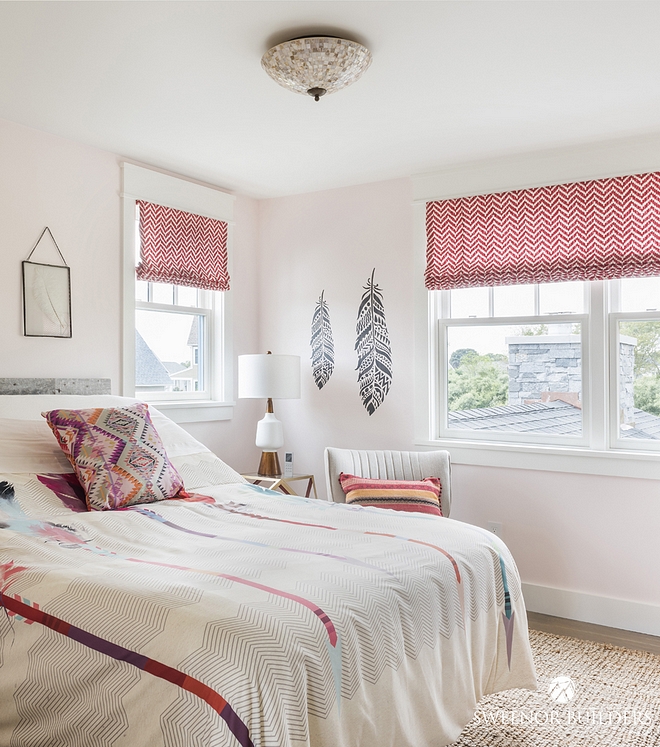 The Bohemian-chic bedding was the inspiration for this girl's bedroom. Wall paint color is Aubergine by Olympic Paint