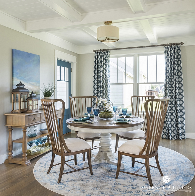 A coffered ceiling with V-groove insets marks the dining area