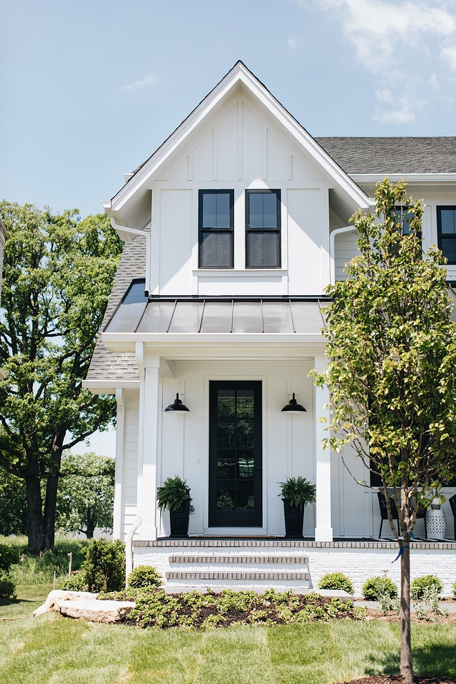 The front door is painted in "Black by Benjamin Moore"