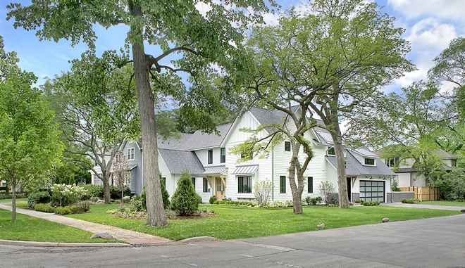 White Modern Farmhouse  on a Corner Lot Home Bunch 