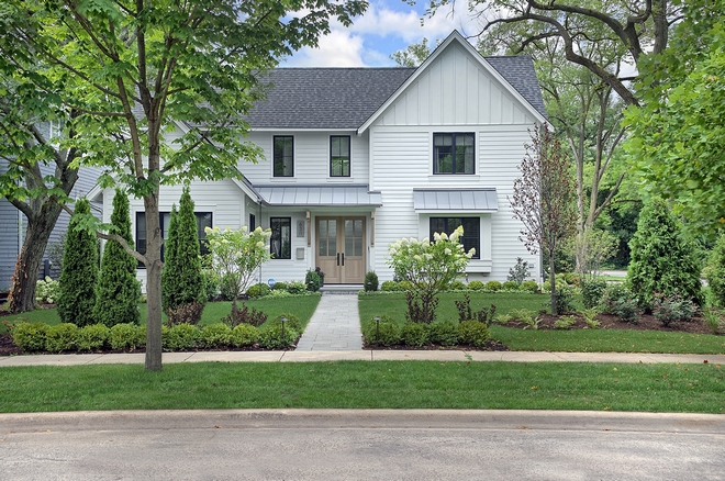 White Modern Farmhouse  on a Corner Lot Home Bunch 