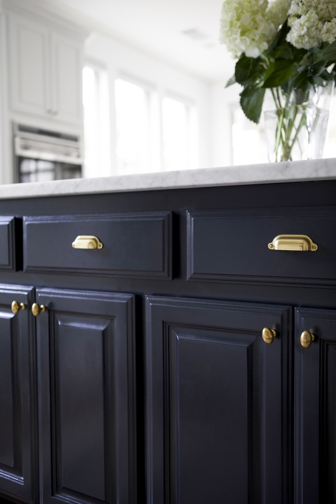 Benjamin Moore Midnight is a deep navy blue paint color that works beautifully on cabinets