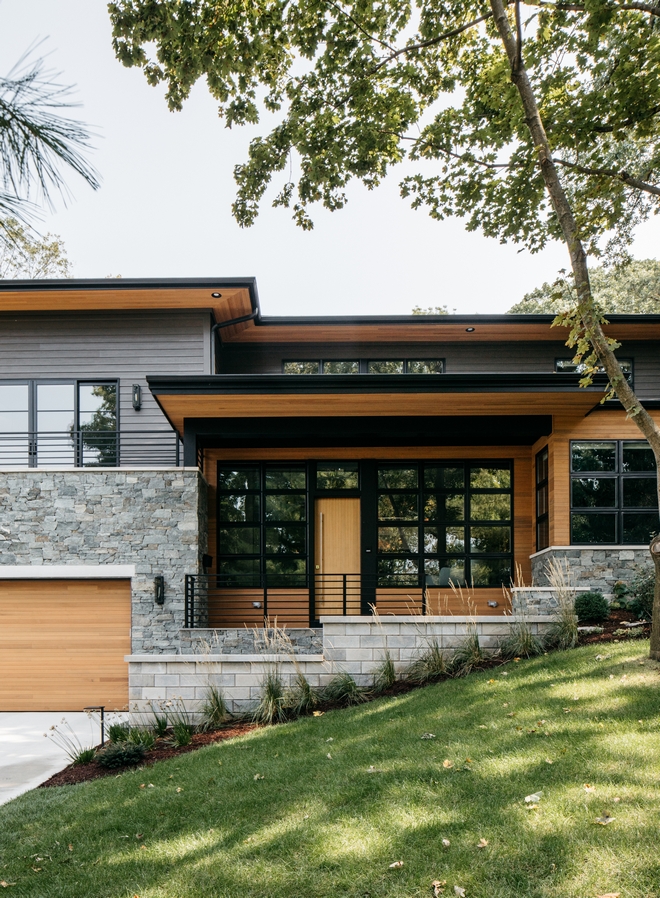 Modern Home Architecture Black Windows Cedar and Walnut Accents Dark Gray Siding in Sherwin Williams Urbane Bronze