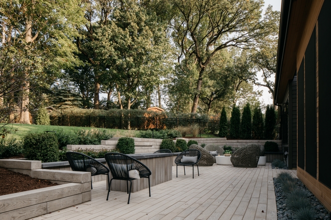 The patio material is concrete blocks made to look like wood