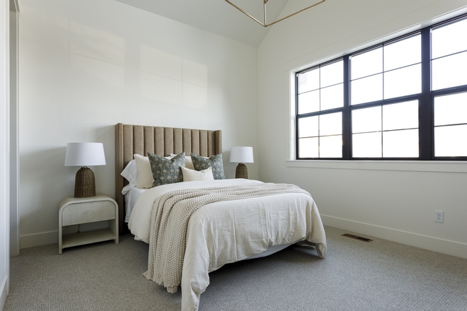 Neutral Bedroom with channeled bed