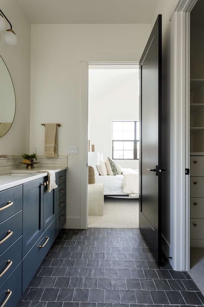 Bathroom Ideas The guest suite bathroom has one of my heart I loved mixing the dark tile floors with a moody cabinet