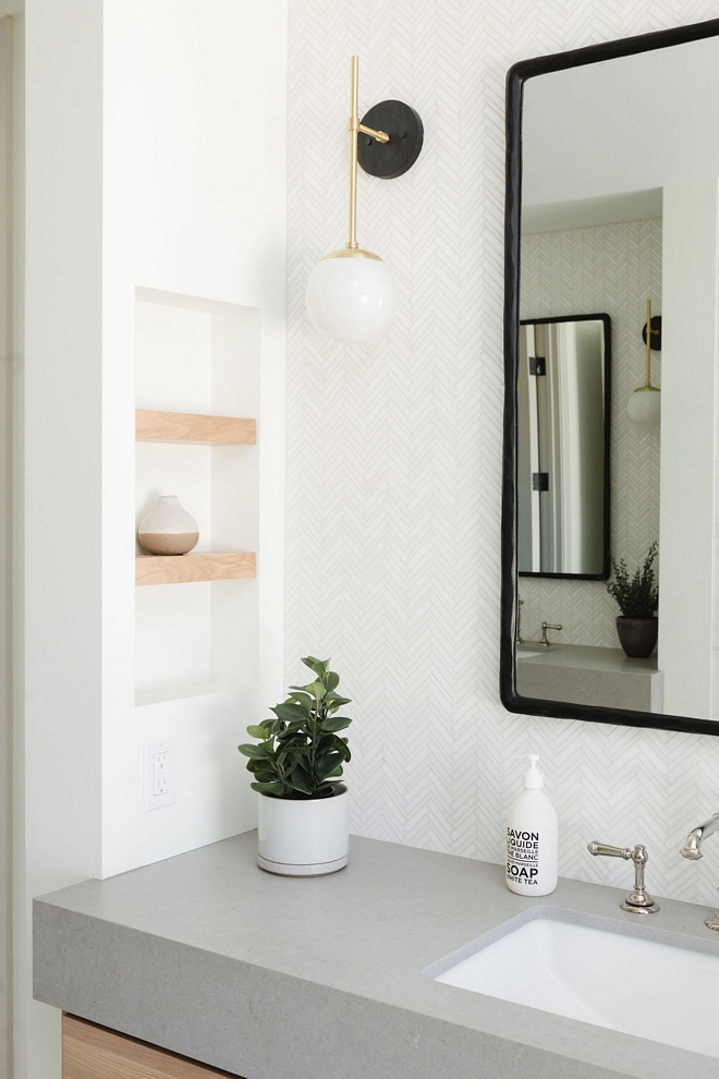 White Oak shelves are tucked into a niche in the wall