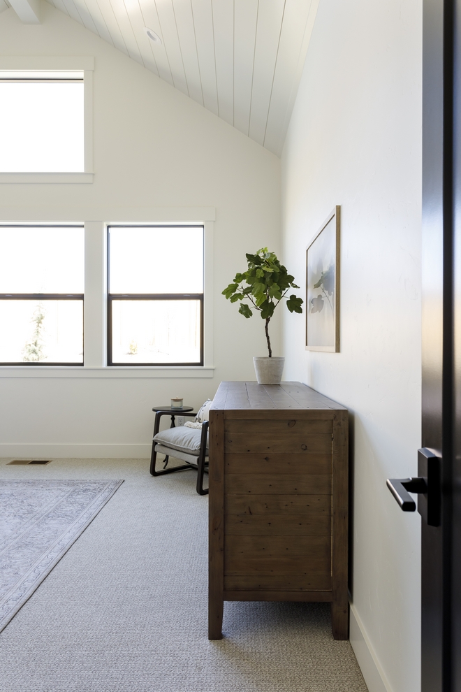 Master Bedroom Soothing hues help to ground this spacious Master Bedroom with vaulted ceilings