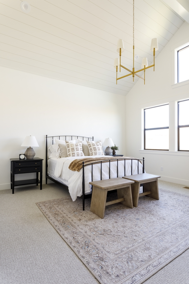 In the Master Bedroom I added a wainscot to this beautiful vault for an extra layer of interest and absolutely adore the way this chandelier finished off the space