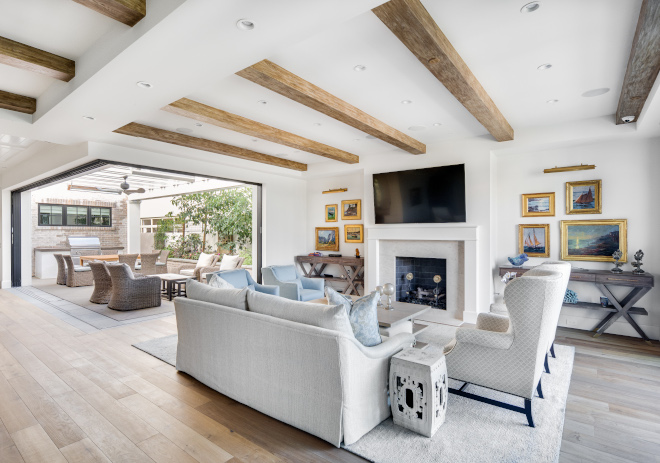 As soon as you enter this California home you notice the retractable patio doors disappear in the Kitchen and Living Room and merge with outdoor spaces