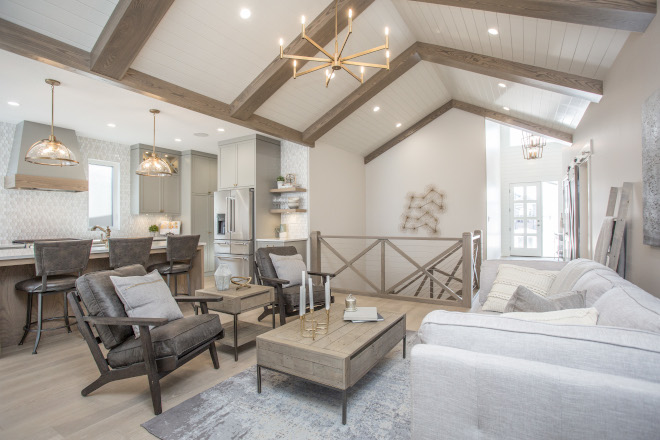 This home was inspired by a modern version of a European farmhouse Calming neutrals with warm wood tones make their way into all the finishes and furniture selections #home #Farmhouseinspired #Europeanfarmhouse #Calmingneutrals #neutrals #warmwood #woodtones #furniture