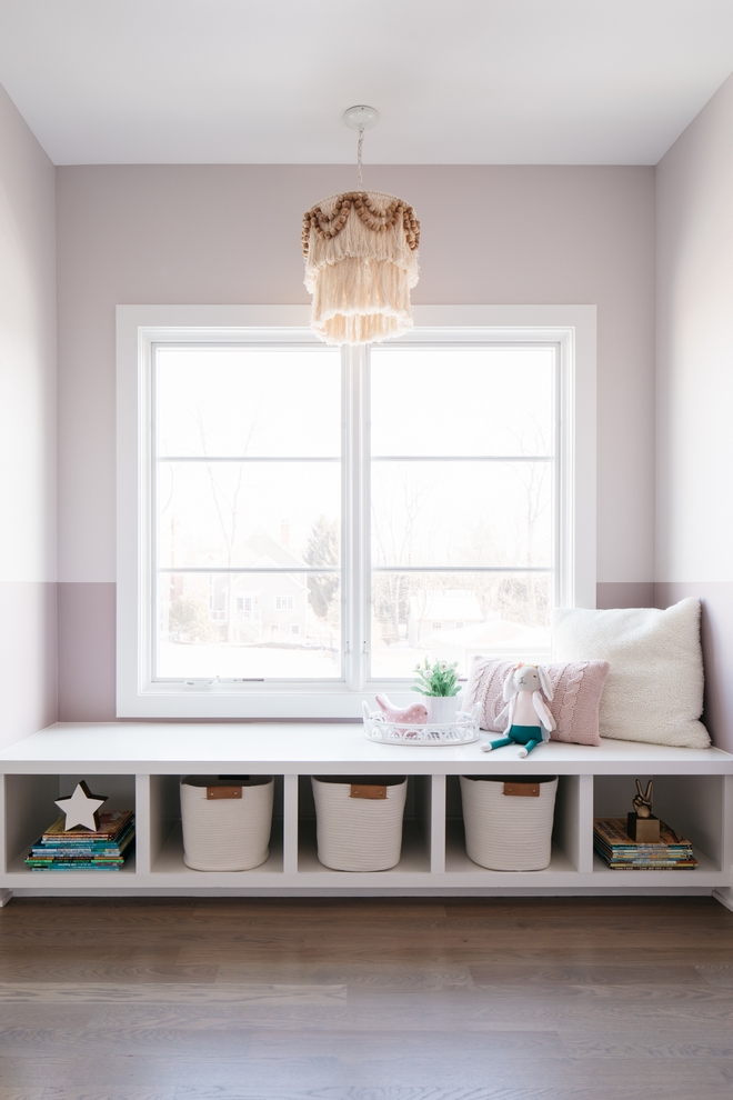 Two toned girl's bedroom paint color Painters tape line at 42" Sherwin Williams Individual White SW 6008 above and Sherwin Williams Intuitive SW 6017 below